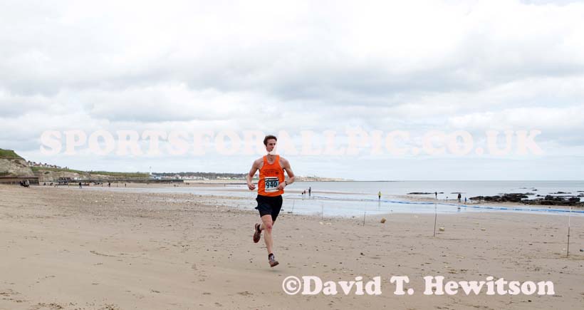 Dan Jenkin (Durham City) leads the Pier to Pier Race, South Shields to Roker, Sunderland.